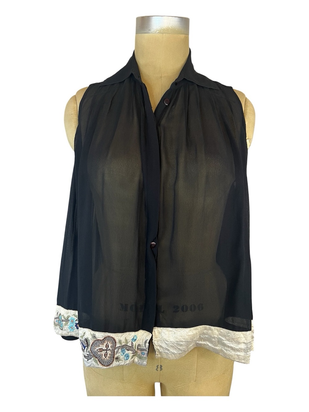 Sleeveless Silk Sheer Black Button-Front Blouse with Embroidered Hem